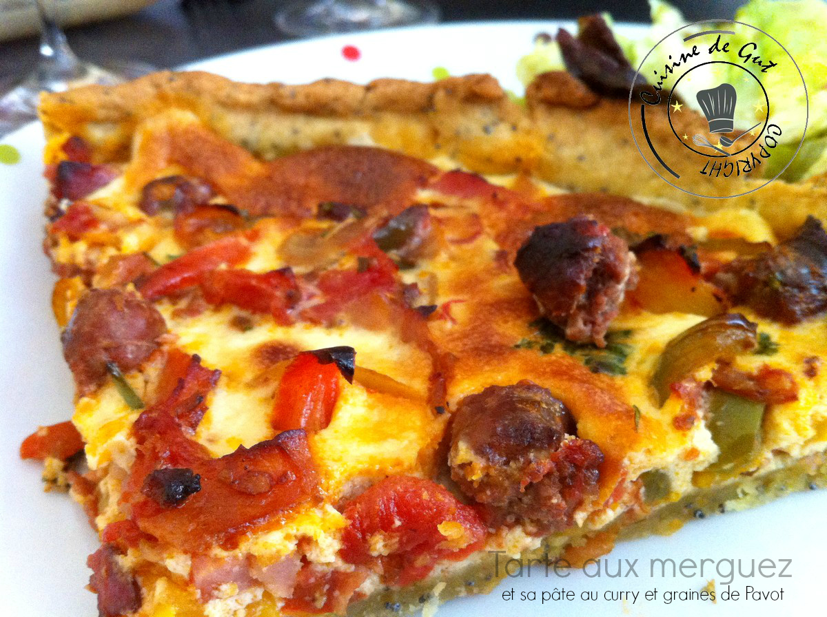 Part de Tarte aux merguez et pâte au curry